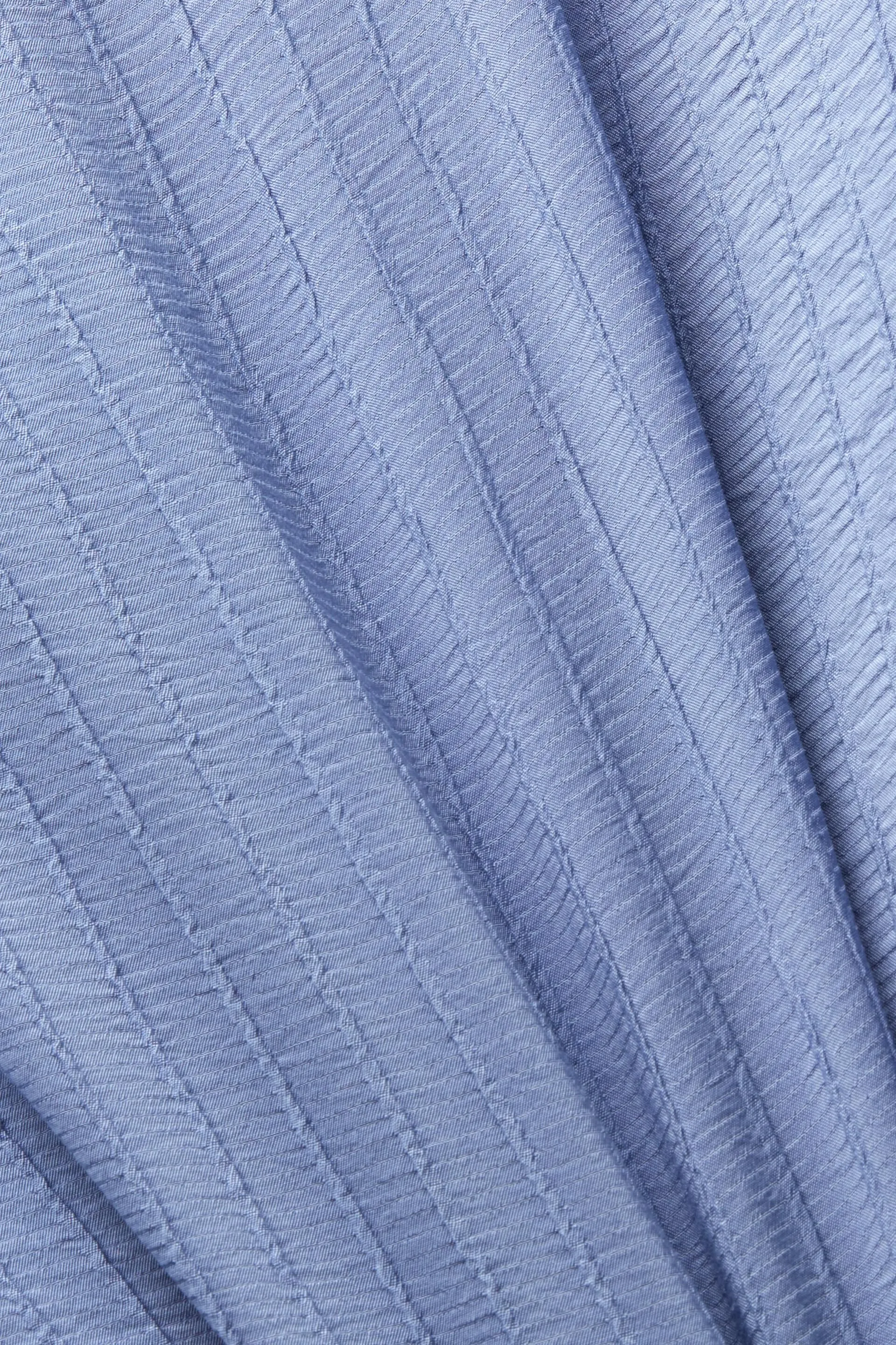 Blusa strutturata a maniche lunghe
