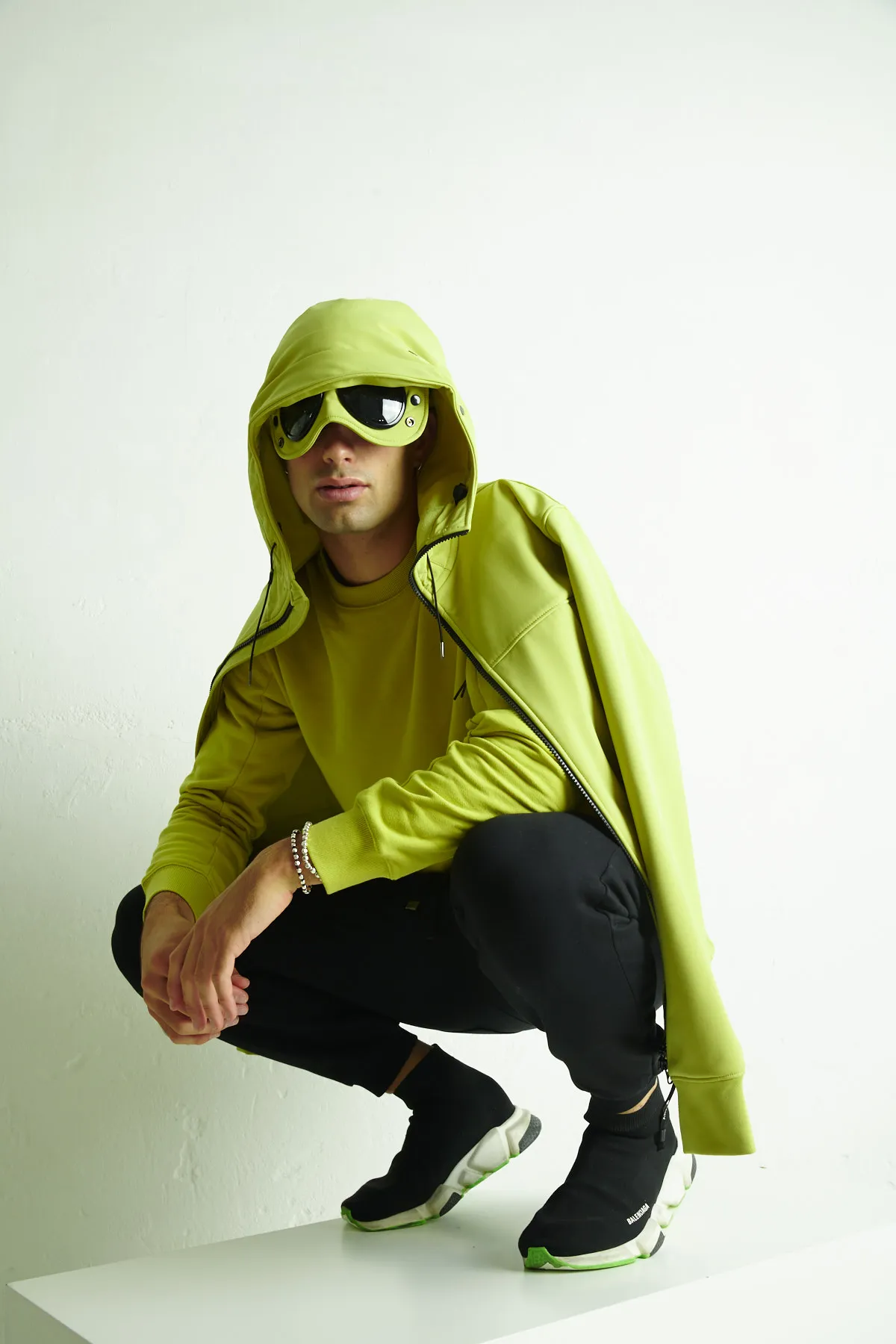 C.P. COMPANY Giubbotto in softshell con lenti nel cappuccio