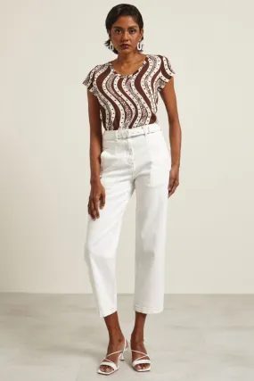 Pantaloni con tasche a filetto