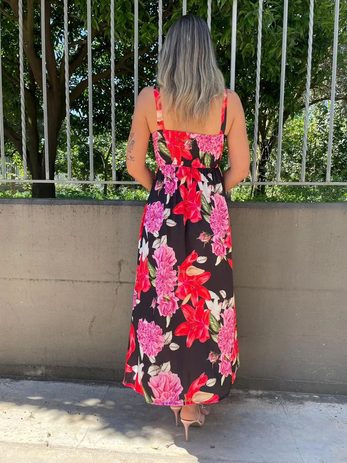 Vestito lungo a fiori con spacco